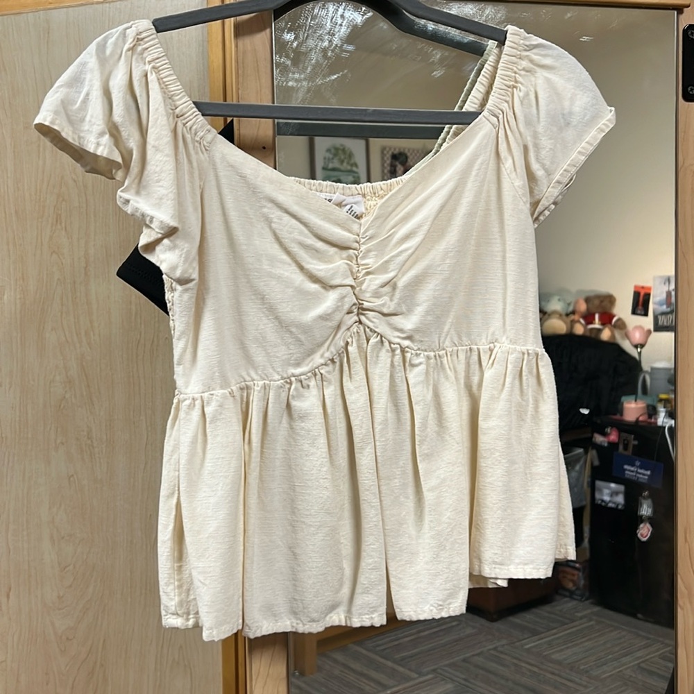 Yellow ruffle peplum top